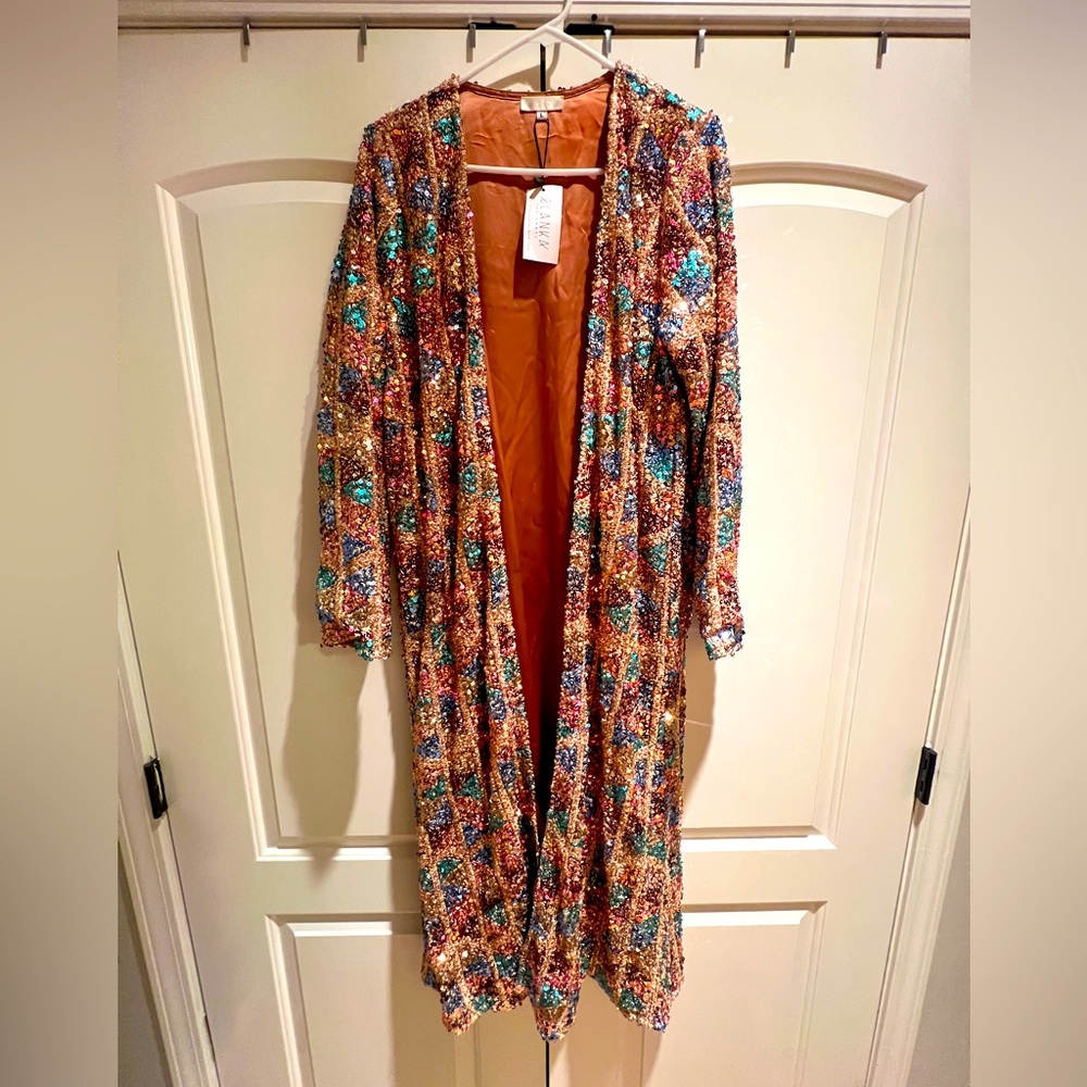 Triangular pattern sequin duster from Blanka Boutique, size L